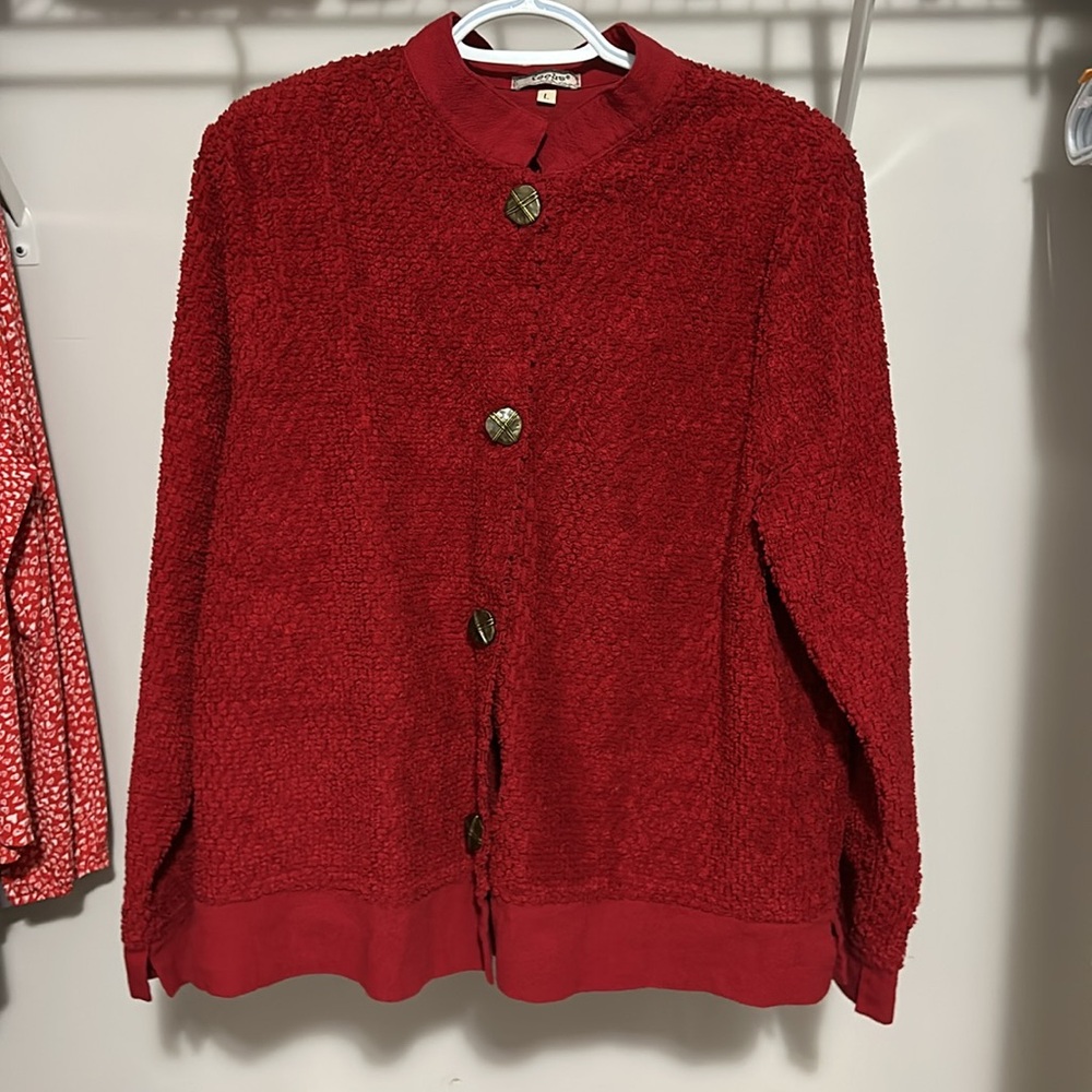 Red jacket size large with pockets fuzzy material